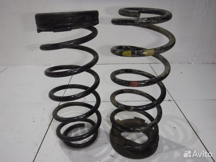 Пружина задняя