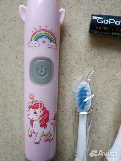 Новая электрическая зубная щетка детская