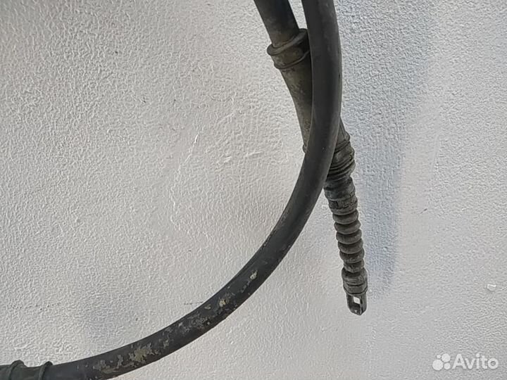 Трос стояночного тормоза левый Hyundai Elantra