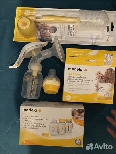 Молокоотсос и бутылочки medela