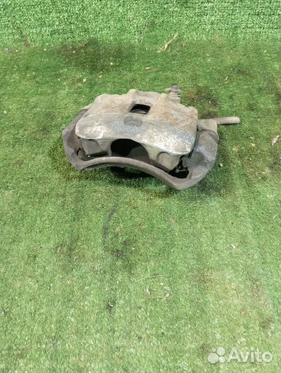 Суппорт тормозной передний левый Hyundai Accent