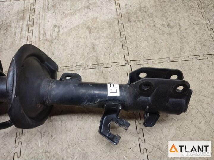 Стойка передняя левая nissan cube