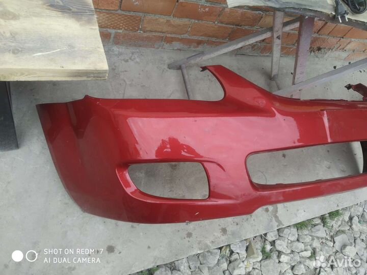 Передний бампер Kia Cerato