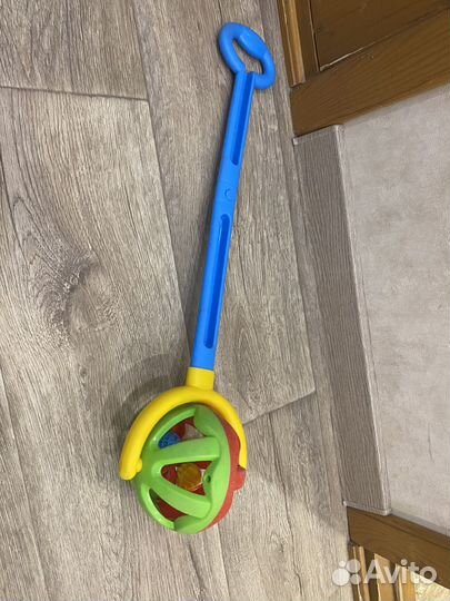 Игрушка каталка с ручкой