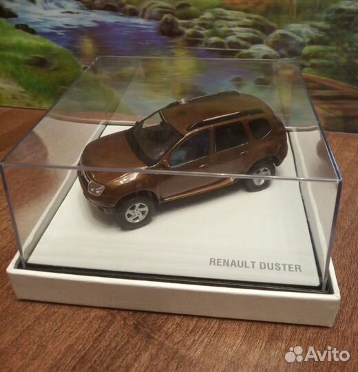 Коллекционная машина renault duster коричневая
