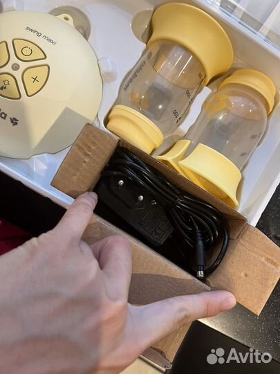 Молокоотсос medela swing maxi flex