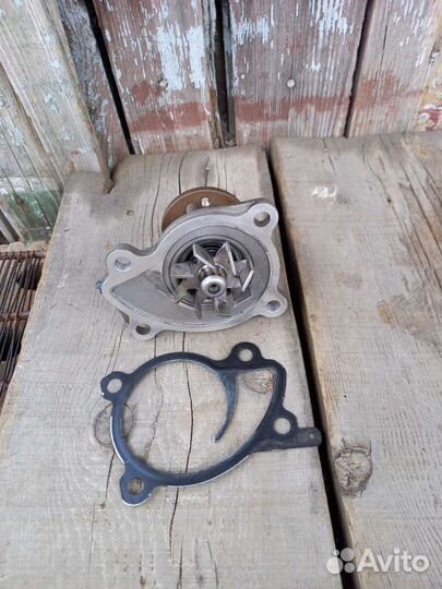 Водяной насос ниссан ноте Е12