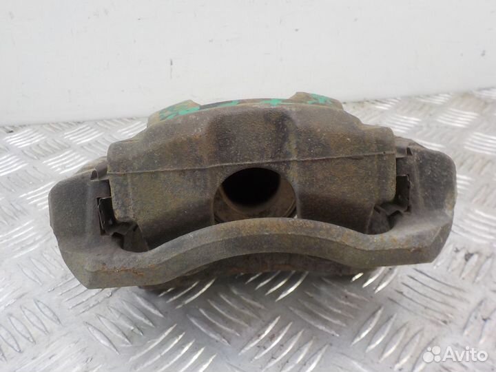 Суппорт тормозной передний правый Opel Astra J 201