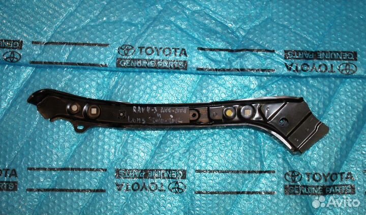 Суппорт фары Тойота Рав 4 -3 левый NEW 53203-42011