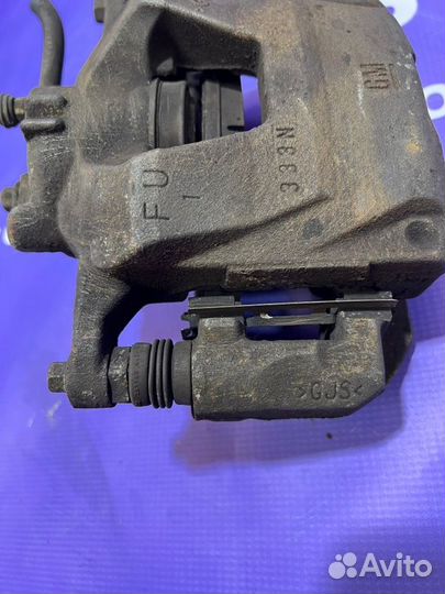 Суппорт передний левый Opel Astra J A16XER 2012