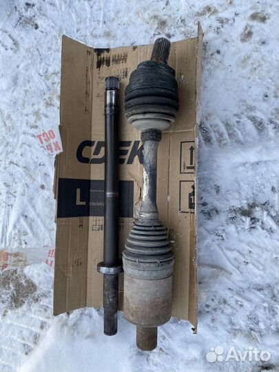 Полуось в сборе с промвалом