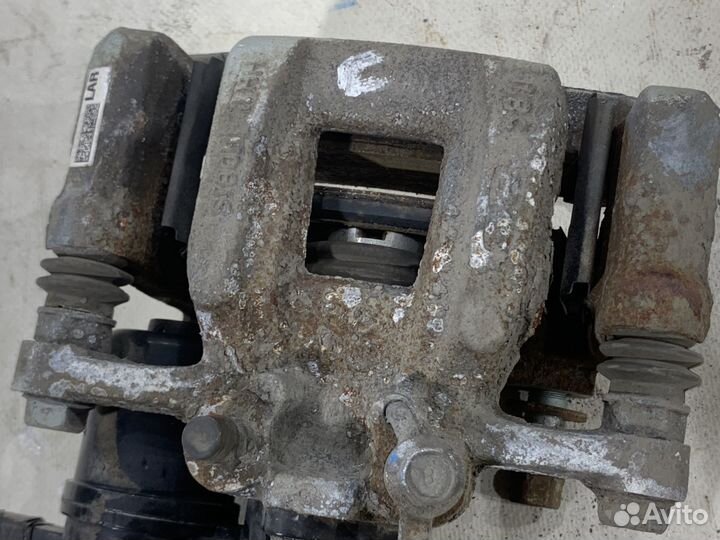 Суппорт тормозной задний правый KIA K5 DL3