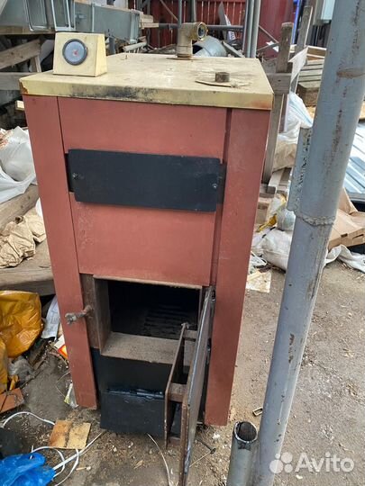 Твердотопливный Котёл отопительный водогрейный