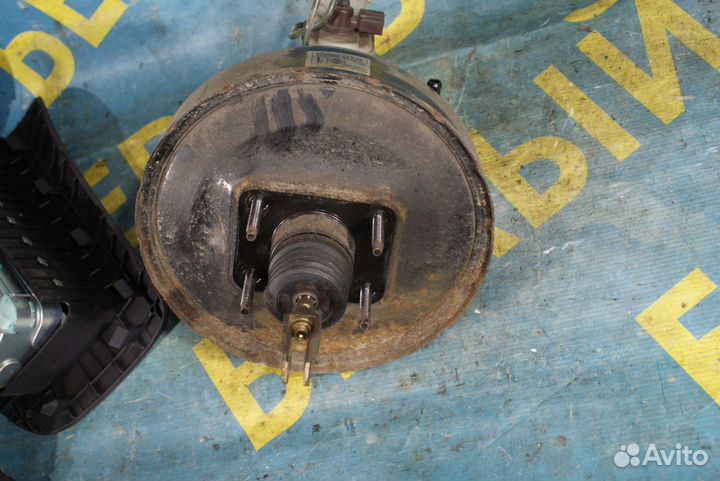 Вакуумник гтц Nissan Almera n16