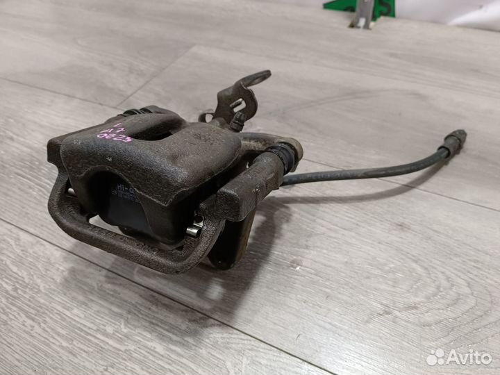 Задний левый суппорт для 1.8 Skoda Octavia A7