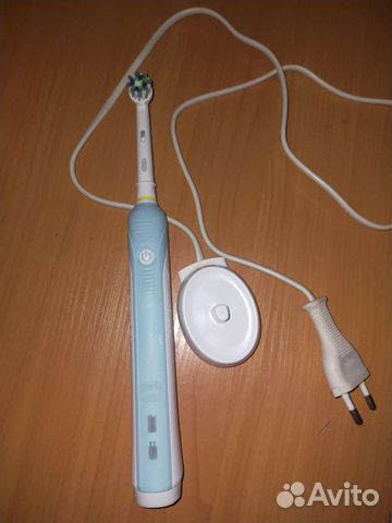 Электрическая зубная щетка braun oral b