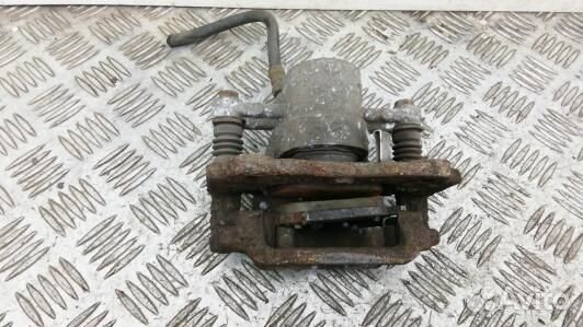 Суппорт тормозной задний правый toyota corolla ver