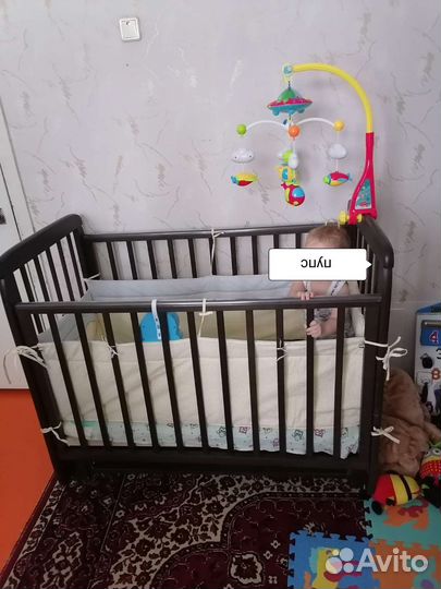 Детская кроватка с маятником и ящиком