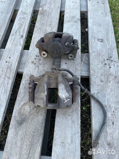 Суппорт тормозной передний Honda CR-V(RE) III