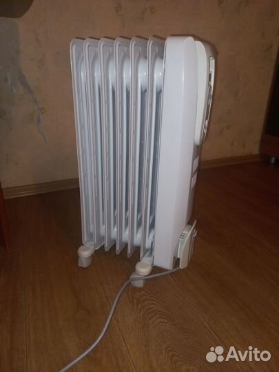 Масляный обогреватель Delonghi