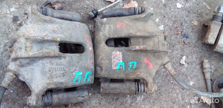 Суппорт тормозной передний левый Peugeot Partner