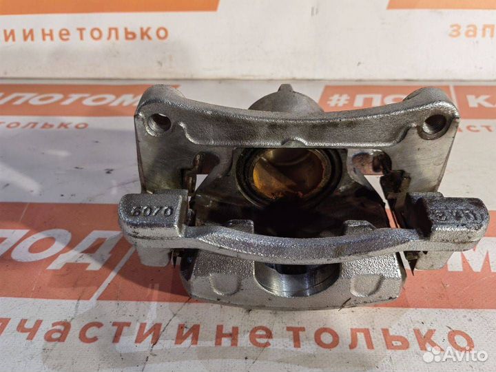 Суппорт тормозной передний левый Mazda CX-5