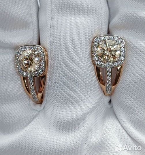 Золотые серьги с камнем