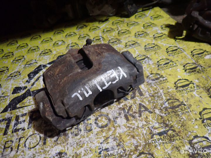 Суппорт тормозной передний левый для Skoda Yeti