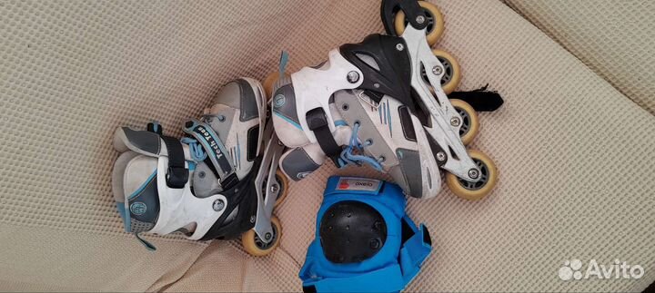 Роликовые коньки