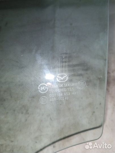 Стекло боковое заднее левое Mazda 3