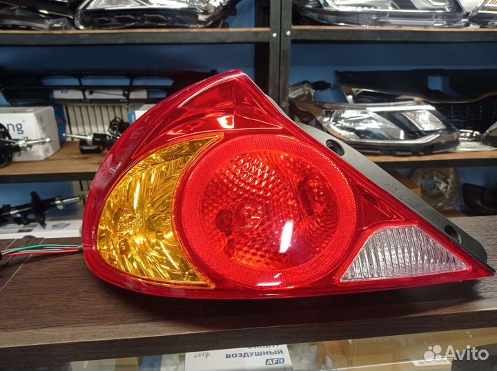 Фонарь задний левый Kia Spectra