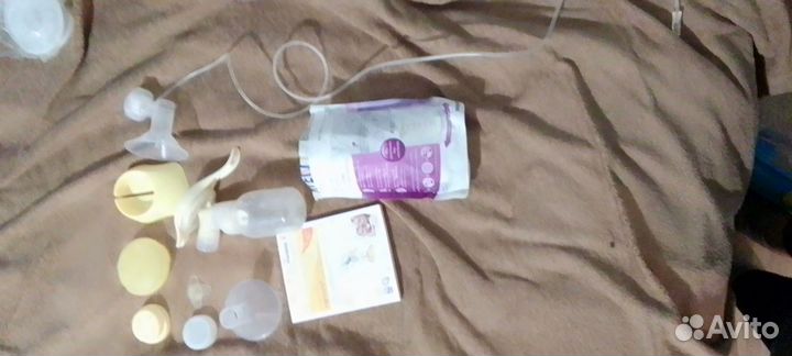 Молокоотсос ручной medela новый