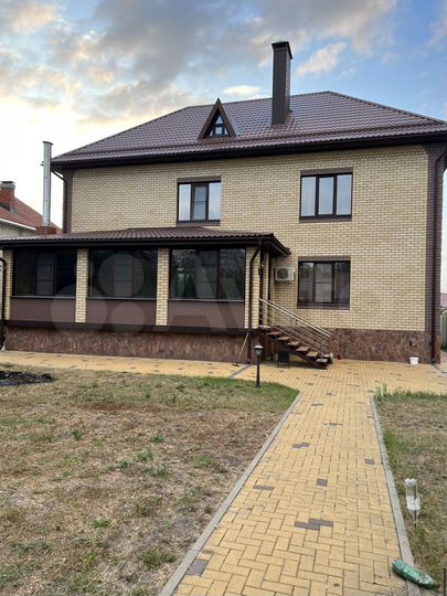 Коттедж 391 м² на участке 12 сот.