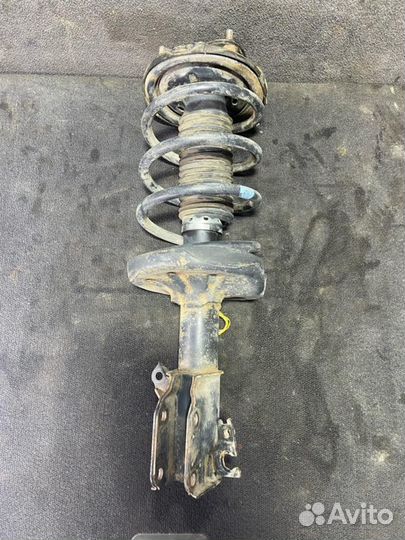 Амортизатор передний правый Mazda Familia 8 (BJ) 1