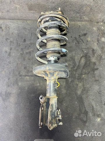 Амортизатор передний правый Mazda Familia 8 (BJ) 1