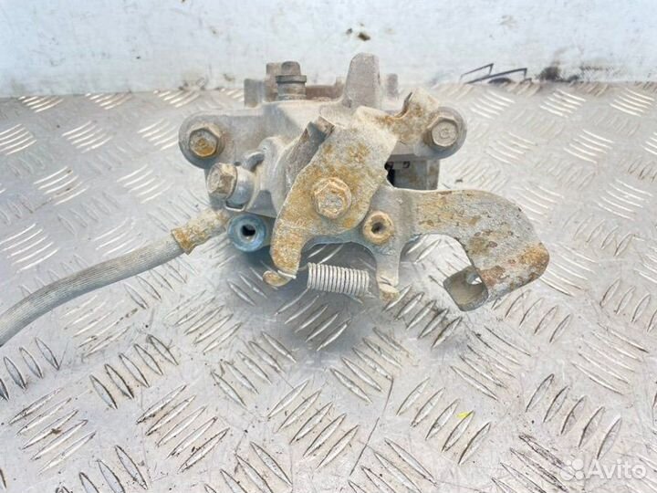 Суппорт тормозной задний правый Toyota Corolla