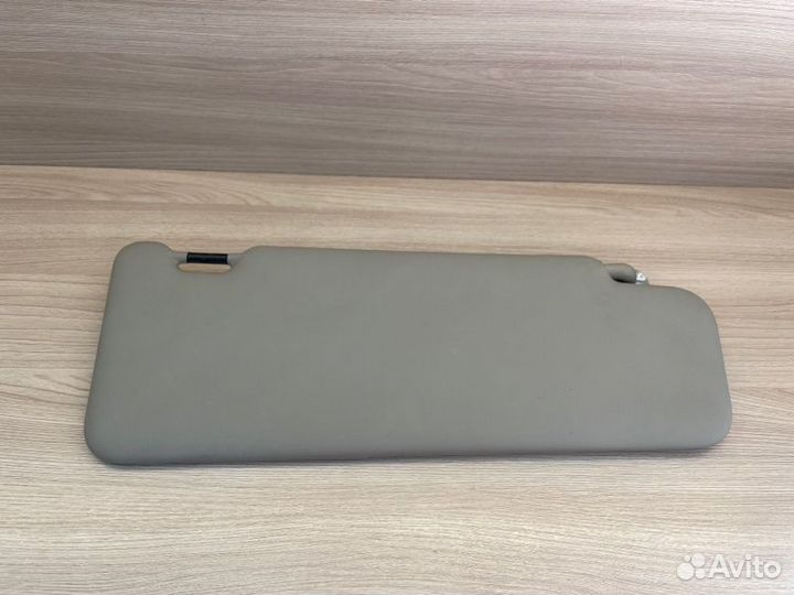 Козырек солнцезащитный левый Renault Logan