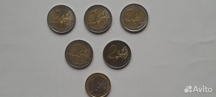 Монеты 1 евро и 2 евро