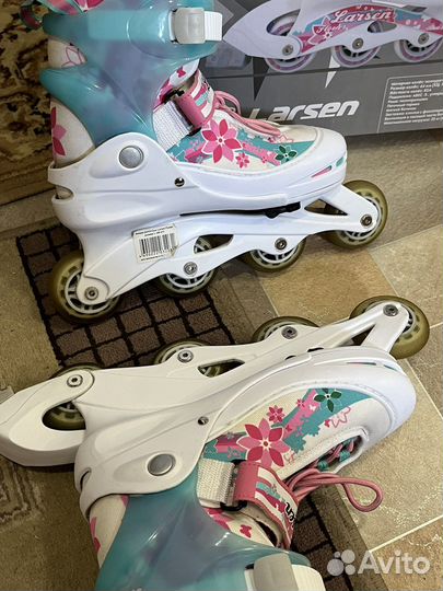 Роликовые коньки