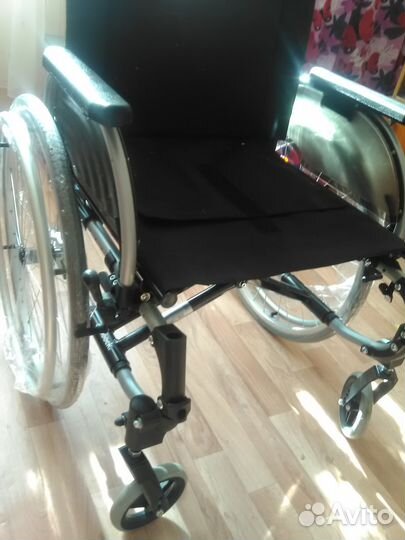 Инвалидная коляска