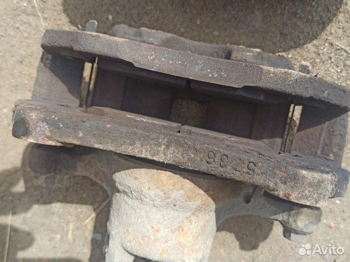 Тормозной суппорт mitsubishi lancer 10