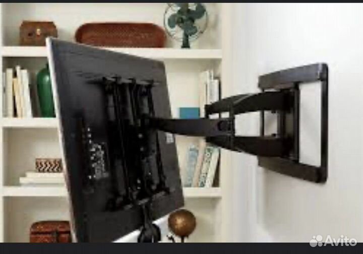 Повесить телевизор на стену,установить кранштейн