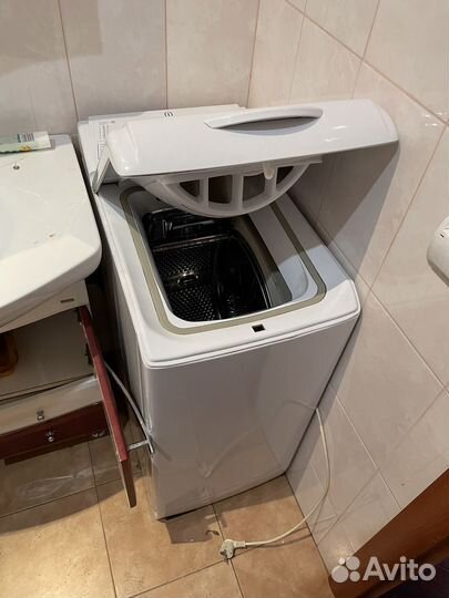 Стиральная машина с вертикальной загрузкой Indesit