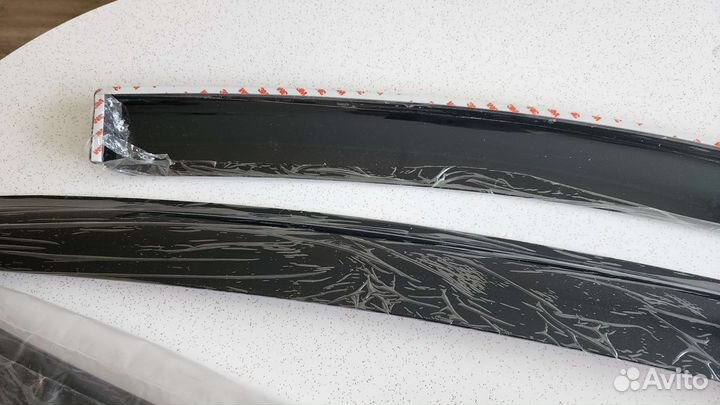 Дефлекторы окон на vesta