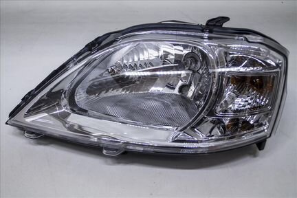 Фара левая Renault Logan