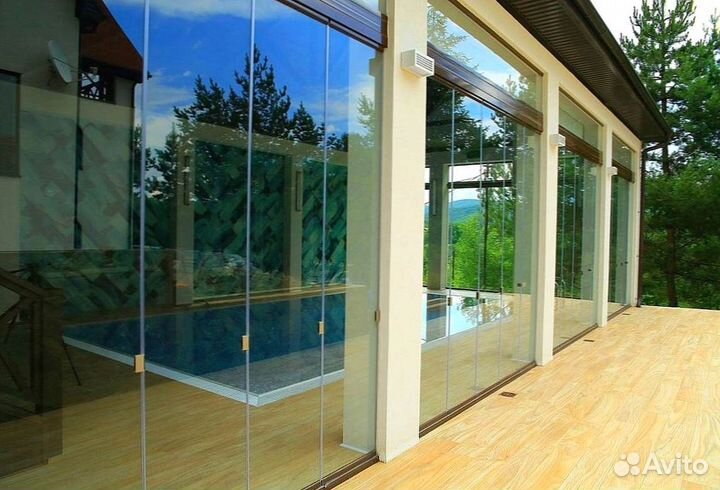 Безрамное раздвижное остекление