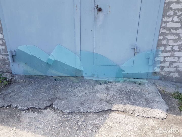 Стекло двери Renault Logan 1