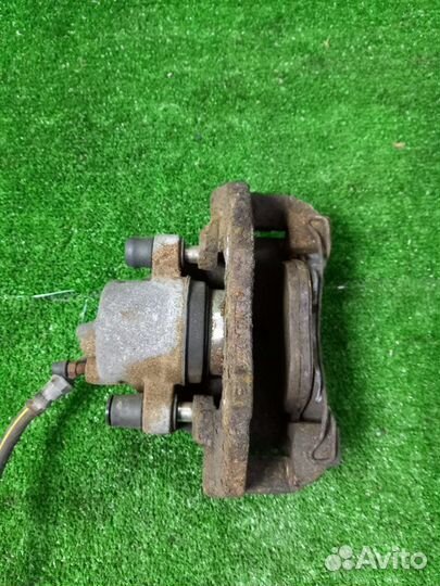 Суппорт тормозной передний левый Ford Focus shda