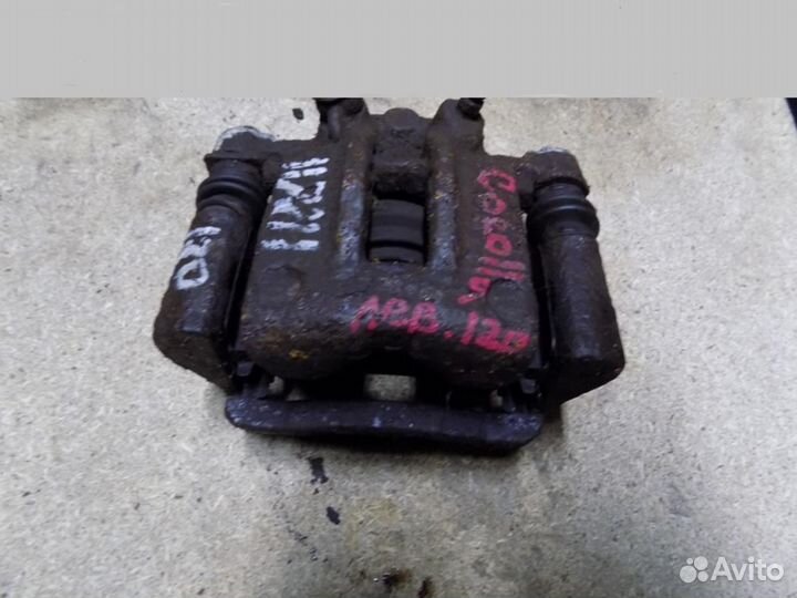 Суппорт задний левый Corolla E12 2001-2006