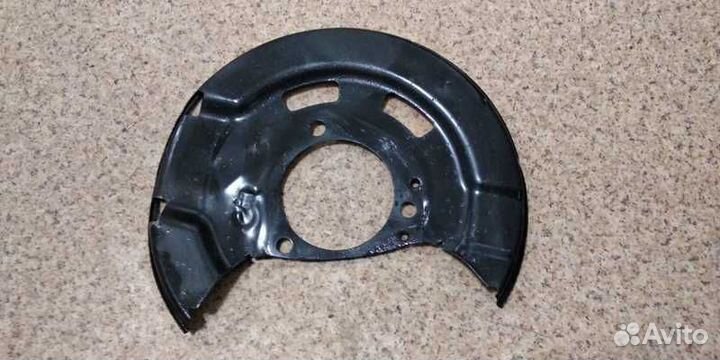 Кожух тормозного диска левый Опель Астра J